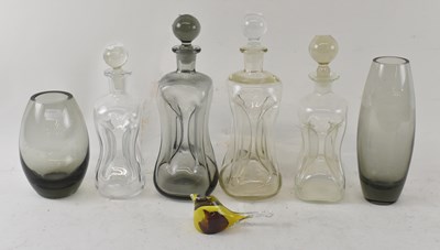 Lot 571 - HOLMEGAARD; a group of four glass decanters...