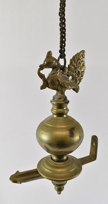 Lot 452 - An Indian brass hanging oil lamp with bird...