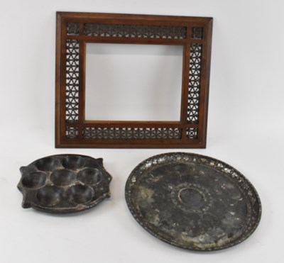 Lot 632 - An Islamic slate pierced dish, an Islamic...