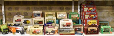 Lot 421 - A quantity of boxed model diecast vehicles,...