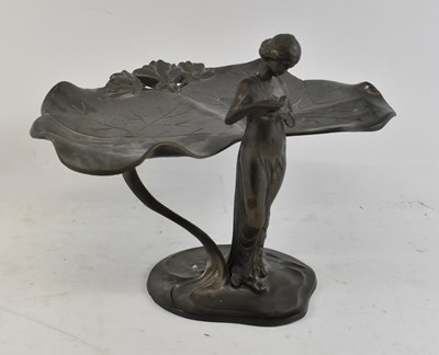 Lot 460 - An Art Nouveau pewter centrepiece decorated...