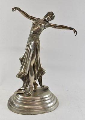 Lot 458 - A large silvered figure of a bare chested...