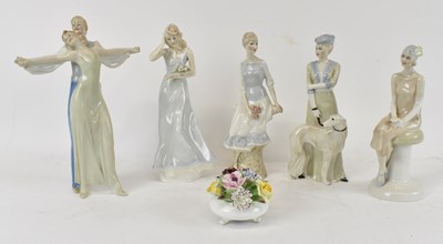 Lot 522 - ROYAL DOULTON; a set of five ceramic figures...