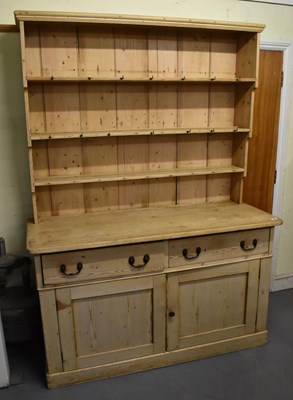 Lot 12 - A late 19th/early 20th century pine dresser,...