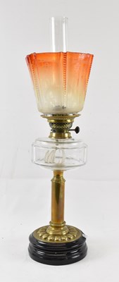 Lot 120 - A Victorian oil lamp on brass base, with...