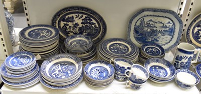 Lot 561 - A large quantity of blue and white dinnerware...