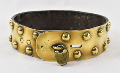 Lot 318 - A 19th century brass dog collar with studded...