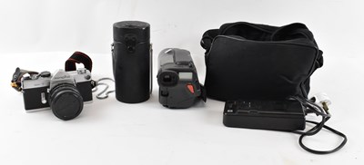 Lot 365 - A Minolta SR-7 camera, a Yashica lens and a...