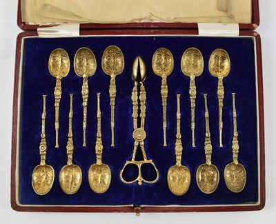 Lot 724 - A WILCOX; a cased set of twelve silver gilt...