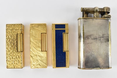 Lot 312 - A group of three gold plated Dunhill lighters...