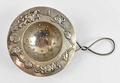 Lot 779 - A Chinese white metal tea strainer, with marks...