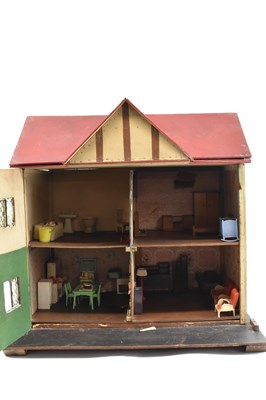 Lot 420 - A 20th century doll's house with hinged door...