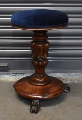 Lot 94 - A Victorian mahogany circular piano stool with...