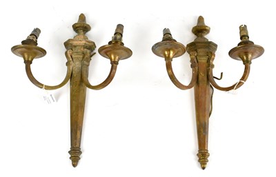 Lot 198 - A pair of brass twin branch wall lights of neo-...