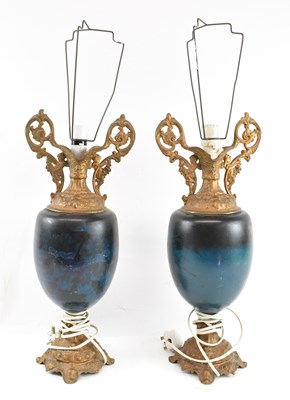 Lot 121 - A pair of 20th century gilt metal mounted...