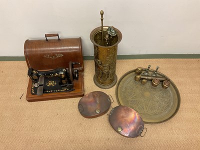 Lot 19 - A Singer sewing machine and various copper and...
