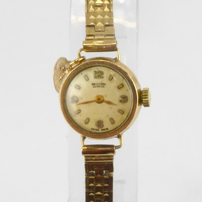 Lot 1011 - RECORD; a lady's 9ct gold wristwatch, the...