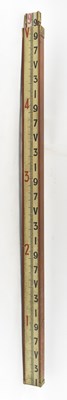 Lot 326 - An early 20th century extendable measuring...