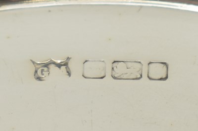 Lot 824 - A George VI period hallmarked silver circular...