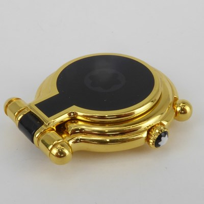 Lot 1021 - MONTBLANC; a gold plated travel alarm clock...