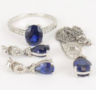 Lot 882 - A suite of 9ct white gold diamond and sapphire...