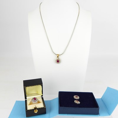 Lot 883 - A suite of 9ct diamond and ruby jewellery...