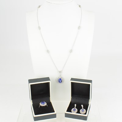 Lot 867 - A suite of diamond and tanzanite cluster...