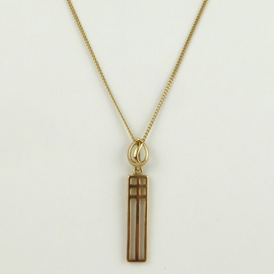 Lot 941 - A gold Mackintosh style pendant on a 9ct gold...