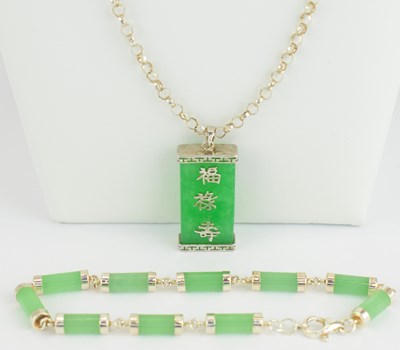 Lot 943 - A modern Chinese jade style silver mounted...