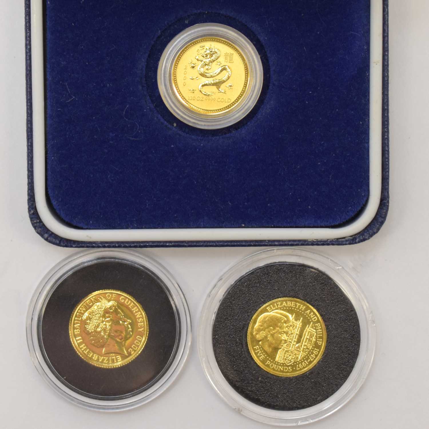 Lot 994 - ROYAL MINT; two Guernsey five pound gold coins,...