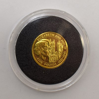 Lot 994 - ROYAL MINT; two Guernsey five pound gold coins,...