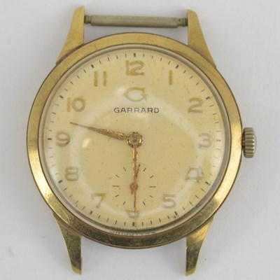 Lot 1022 - GARRARD; a gentleman's 9ct gold watch head...