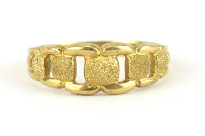 Lot 972 - A 9ct gold band ring with textured open top,...