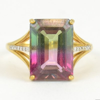 Lot 944 - A 9ct Fuchsia Verde topaz and diamond yellow...