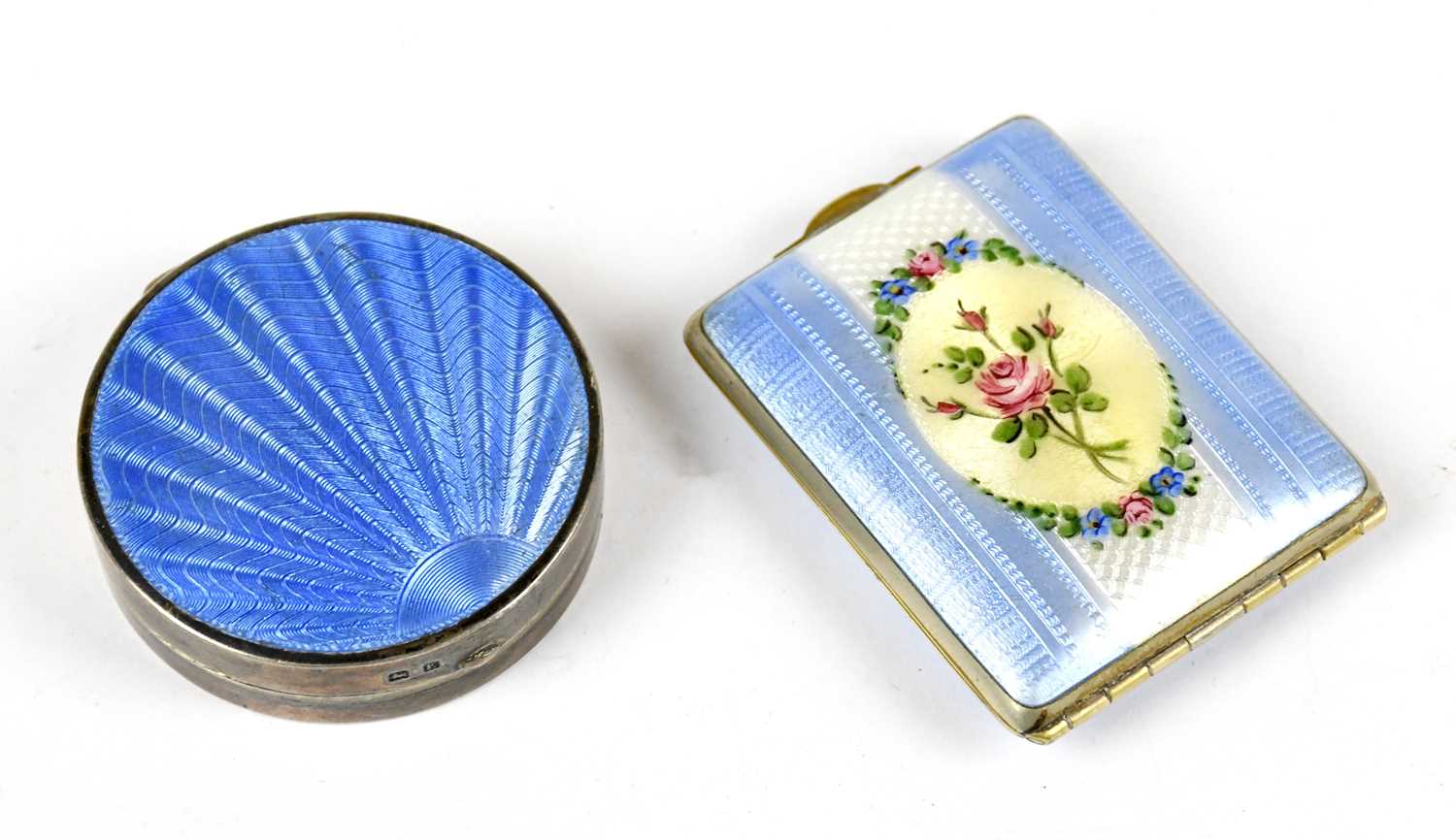 Lot 2381 - A hallmarked silver and enamel circular