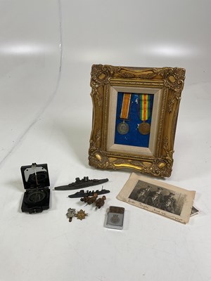 Lot 84 - A collection of medals, photos and some...