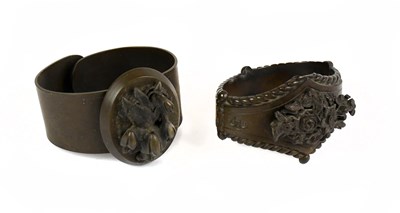 Lot 1285 - Two late Victorian bakelite bangles, one with...