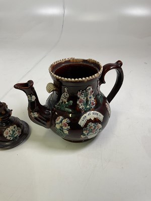 Lot 222 - A 19th centuty bargeware teapot and cover with...