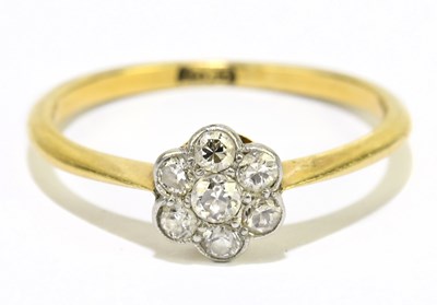 Lot 1196 - An 18ct yellow gold and diamond flower head...