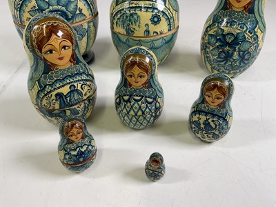 Lot 18 - A good set of eight Russian wooden dolls from...