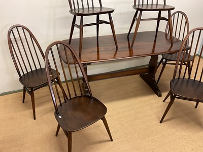 Lot 474 - ERCOL; a dining table and six dining chairs,...