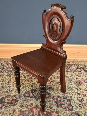 Lot 92 - A Victorian mahogany shield back hall chair on...