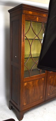 Lot 2720 - An Edwardian inlaid mahogany library bookcase,...