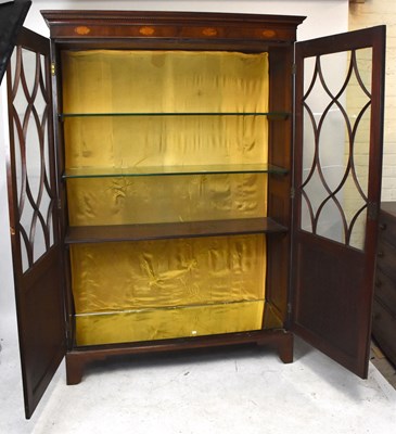 Lot 2720 - An Edwardian inlaid mahogany library bookcase,...