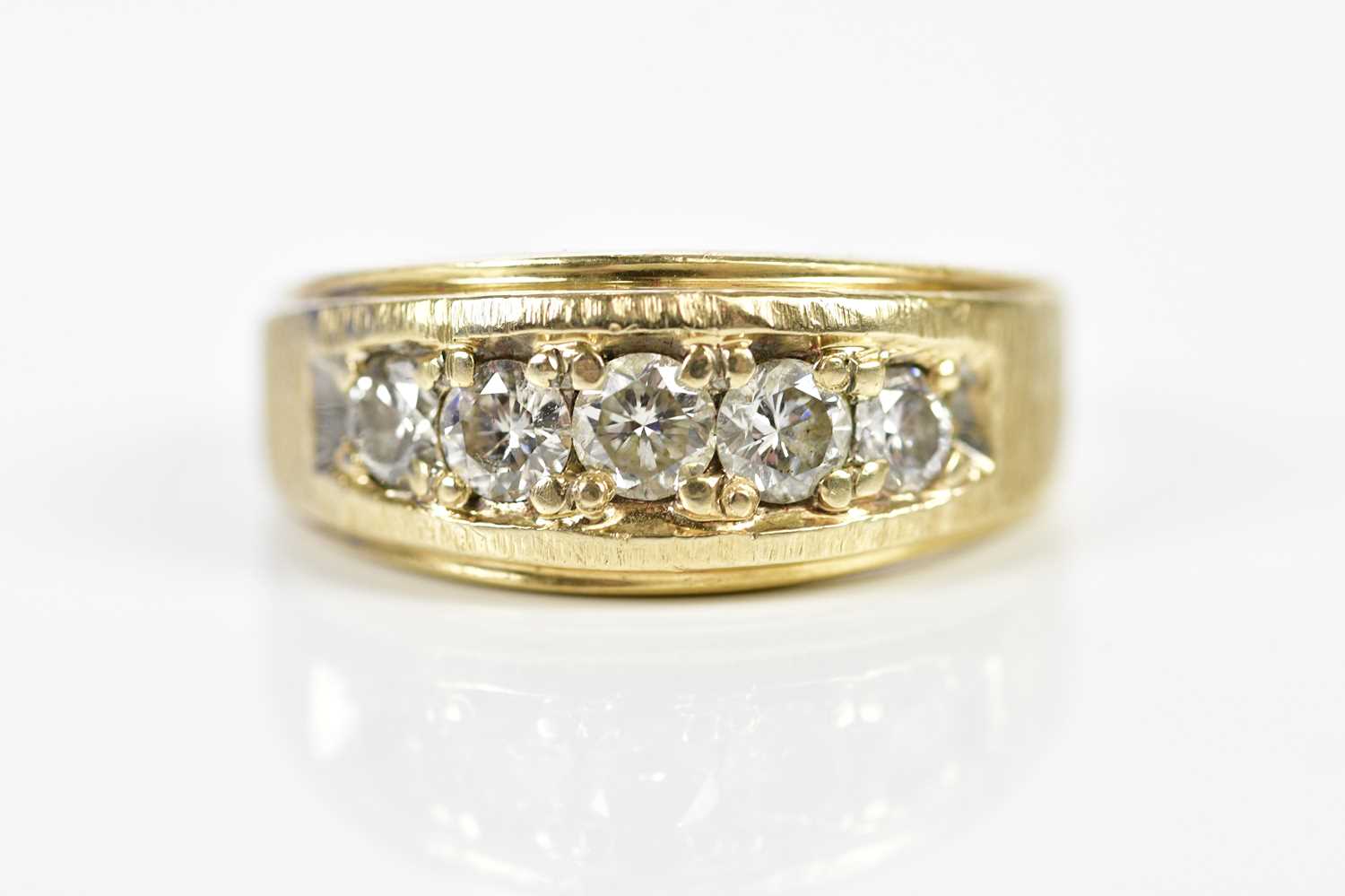 Lot 54 - A 14ct yellow gold five stone graduated...
