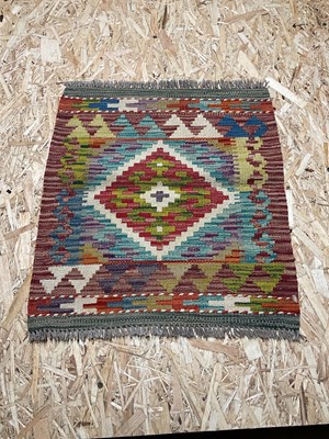 Lot 599 - A Chobi Kilim rug, 45 x 50cm.