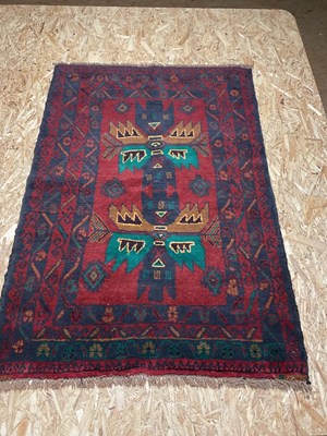 Lot 593 - A Baluchi rug, 124 x 86cm.