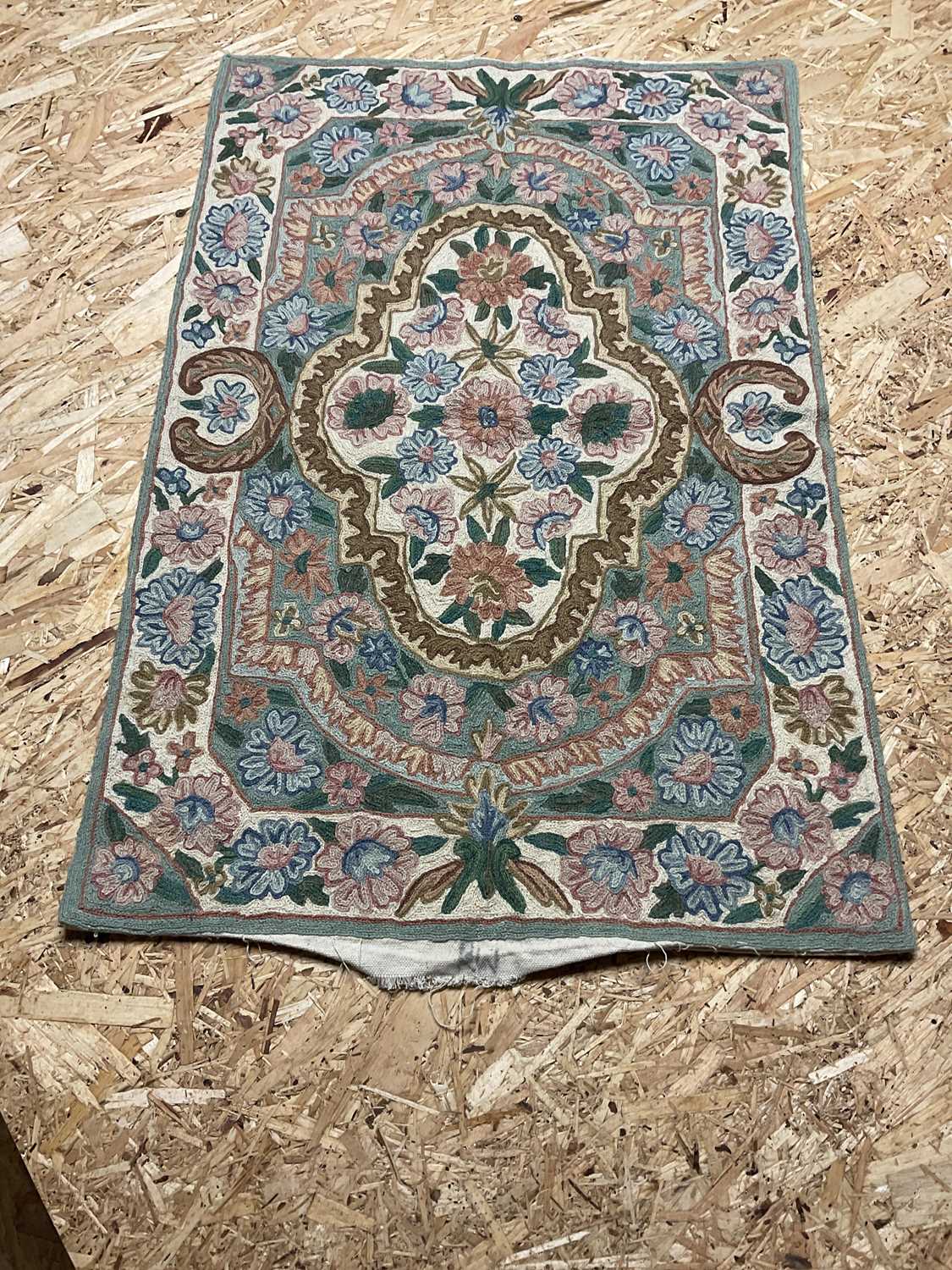 Lot 434 - A Kashmir hand stitched wool chain rug, 86 x