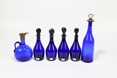 Lot 539 - Four Georgian Bristol Blue decanters, brandy,...