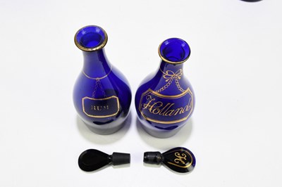 Lot 539 - Four Georgian Bristol Blue decanters, brandy,...